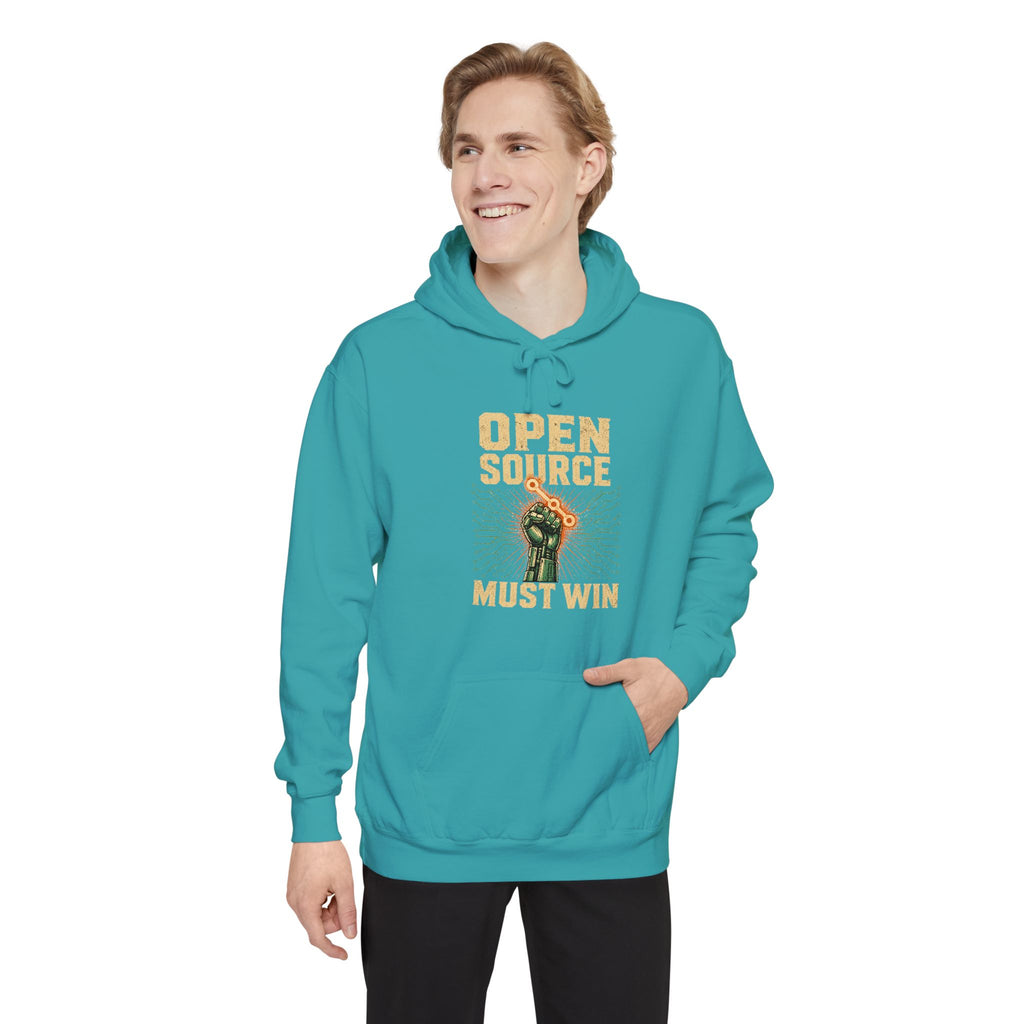 Open Source Must Win — Garment-Dyed Hoodie — Open Source Must Win — robotic fist holding a git branch, vintage propaganda style