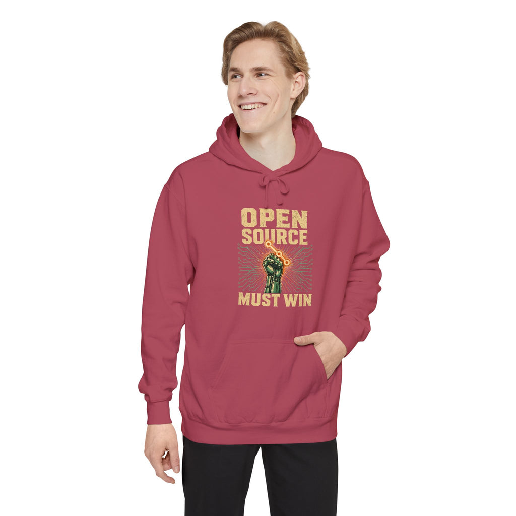 Open Source Must Win — Garment-Dyed Hoodie — Open Source Must Win — robotic fist holding a git branch, vintage propaganda style