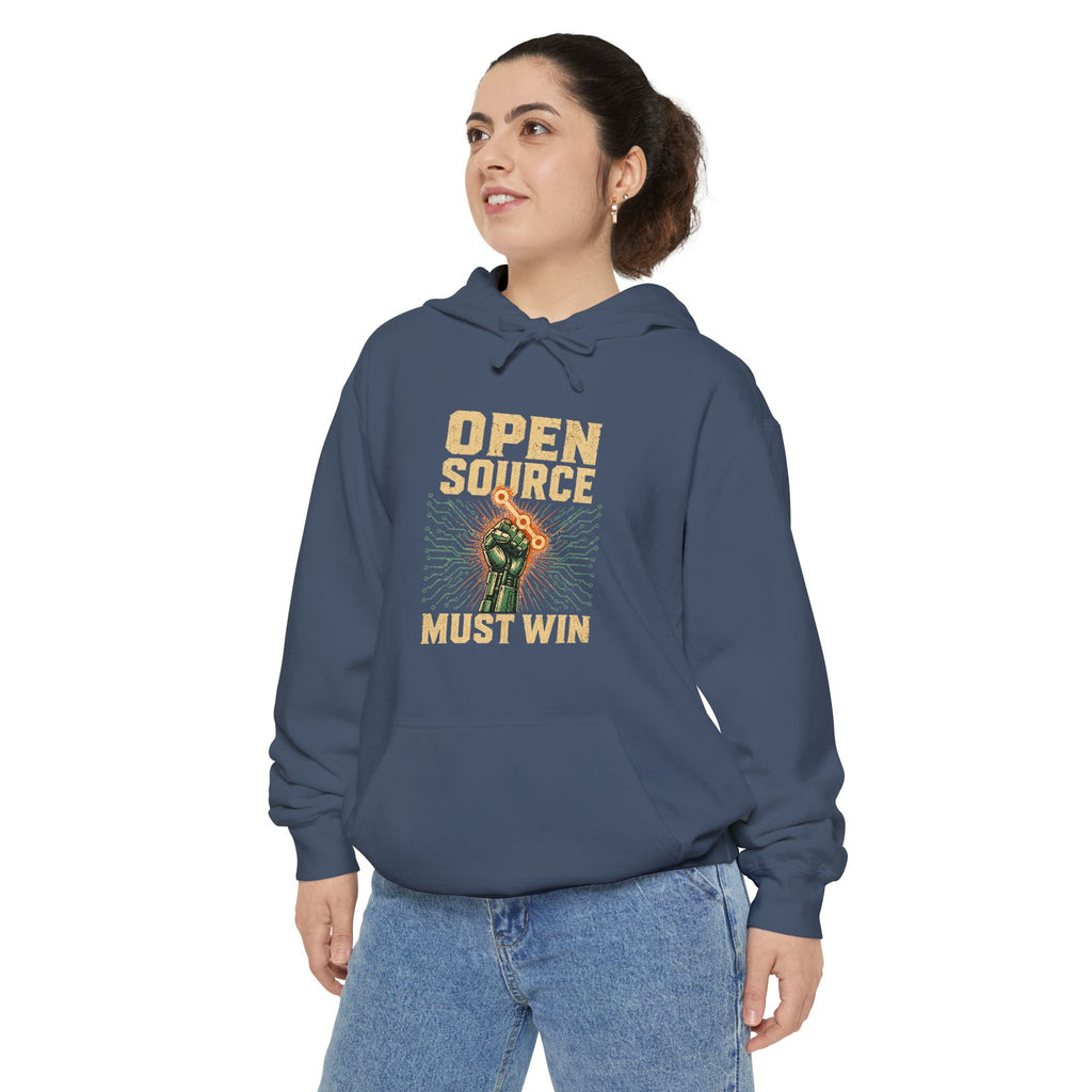 Open Source Must Win — Garment-Dyed Hoodie — Open Source Must Win — robotic fist holding a git branch, vintage propaganda style